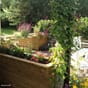 Frodige uterom terrasse veranda med blomsterkasser plantekasse blomsterkasseriet høye.jpg
