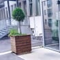 Isolerte blomsterkasser i impregnert furu sameie borettslag inngangsparti fellesareal uterom vintergrønt Blomsterkasseriet plantekasser 2.jpg